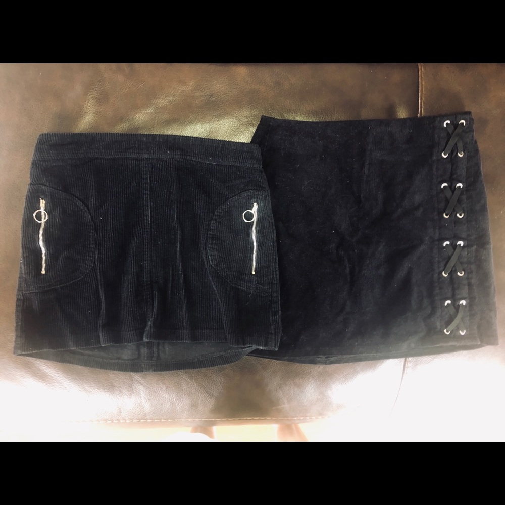 two black ribbed skirts